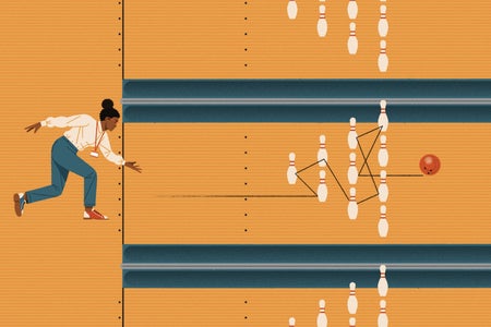 Woman bowling.