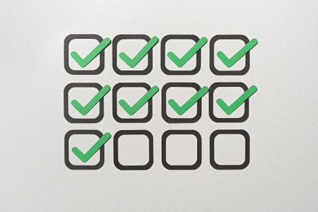 Unfinished Checklist With Check Marks Paper Craft on Beige Background