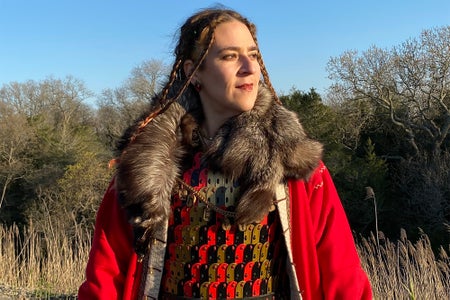 Portrait of Ericka Skirpan in red coat with fur trim